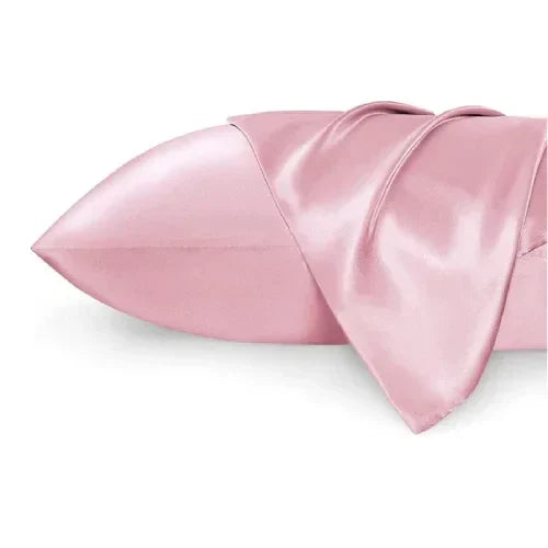 Fronha de seda rosa para almofada ergonómica, com acabamento suave e brilhante.